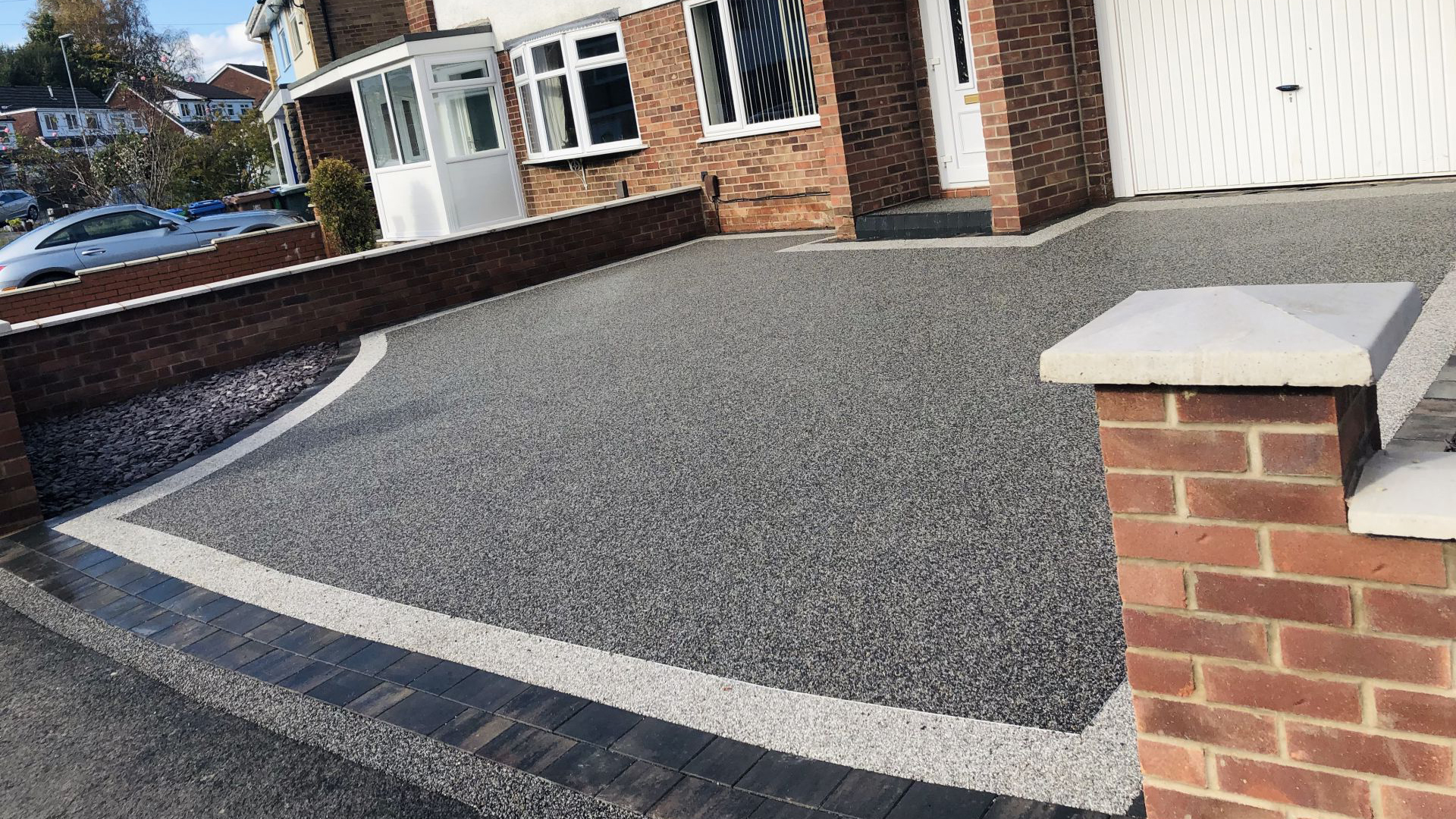 Resin driveway serving Sinfin